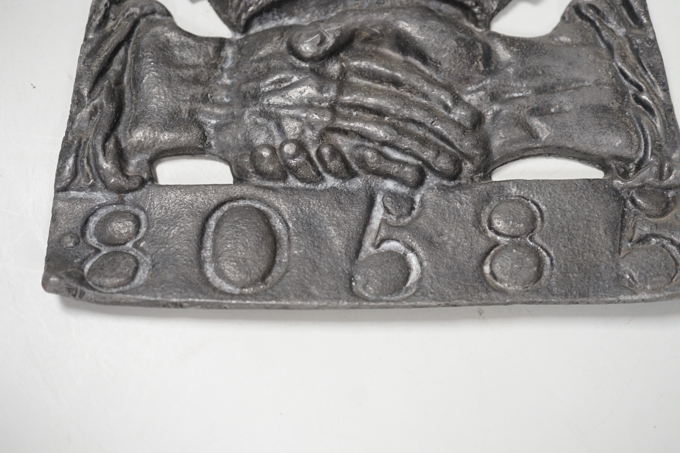 A lead fire mark. 20cm tall
